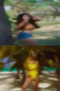 Naked woman using ball PA bat